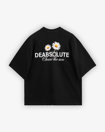 Black t-shirt with white text and daisy flowers on a white background
